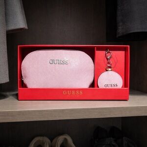Guess Light Pink Embossed Logo Clutch